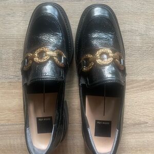 Dolce Vita Black and Gold Loafers with Chain Detail